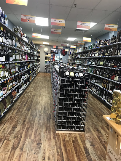 Tag Liquors of Holbrook Inc